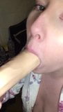 sucking on big dildo snapshot 3