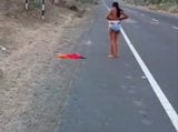 Latina girl walking nude by the road snapshot 2