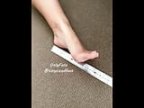 TinySizedFeet Measuring against ruler and home items snapshot 4