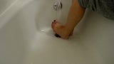 TSM - Dylan Rose plays with water using her feet snapshot 7