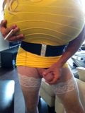 Busty smoking crossdresser in yellow snapshot 8