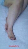 Another perspective, Anna looks beautiful in bed with bare feet. Do you think it's beautiful? snapshot 2