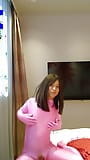 Amateur crossdresses wearing pink and leopard morphsuit masturbate snapshot 2