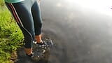 Swimming in the lake in sport wear at sunset.. Wet leggings and t-shirt... snapshot 2