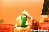 Busty MILF rides a bottle like crazy snapshot 13