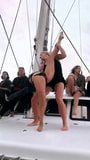 Nina Dobrev dancing with a blonde friend on a boat snapshot 3