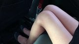 Legs and pantyose in a car snapshot 2