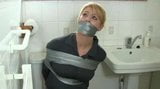 Girl Gets Duct Tape Wrap Gagged in the Bathroom snapshot 3