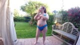 Wife Showing off bikini in garden snapshot 2