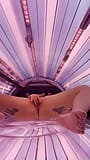 Horny brunette masturbates in the solarium snapshot 7