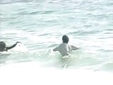 Sexy French ebony gets her tits sprayed on the beach snapshot 8