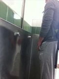 GUY STROKING AT THE URINAL snapshot 1