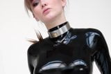 Model in latex catsuit and ballet boots. snapshot 3