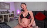 beautiful topless pregnant Latina oils stomach snapshot 2