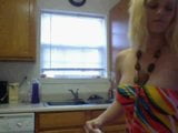 Milf Lizzy showing tits in her kitchen on cam 2 snapshot 2