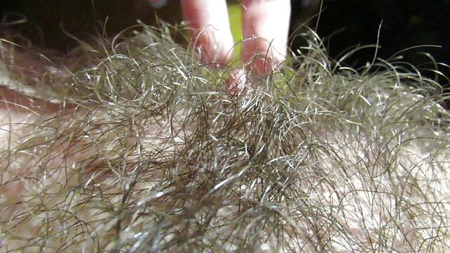 Experience the Joy of Clitoral Excitement with a Curly Hairy Cleft, Intimate Amateur Video.