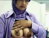 Indonesian house wife yoli with hijab playing boobs snapshot 3