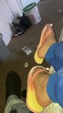 Ebony feet in colorful flip flops snapshot 7