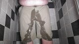 Wetting shorts-big piss flood snapshot 4