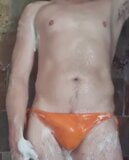 Another quick shower in sexy orange bikini snapshot 10