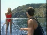 Hung stud gets head on a boat from a sexy blonde, then fucks her snapshot 2