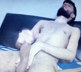 Bearded young Latino edging his huge uncut cock snapshot 4