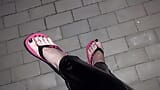 crossdresser in sexy flip-flops and latex leggings snapshot 10