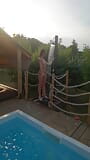 Angel takes an exotic outdoor shower snapshot 8