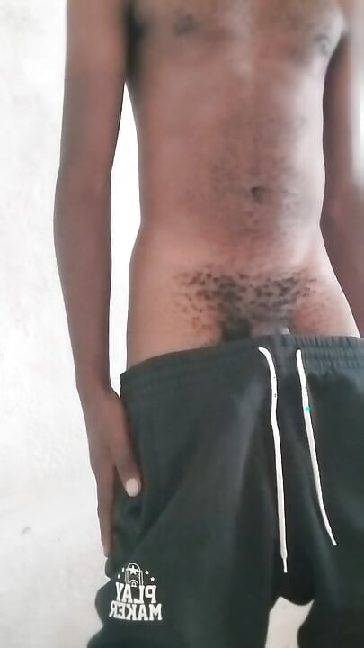 Solo African twink massively stroking his black cock Inthe morning
