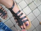 Public cum on dangling sandal snapshot 1