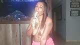 Topless desi squeezes her boobs as she sucks and deepthroats on a banana snapshot 3