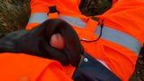 Worker in hiviz rain gear and rubber boots snapshot 7