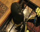Yellow and black - the bikerslave gets a massage in the cage snapshot 9
