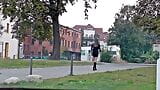 Кроссдрессер-транс в короткой юбке и сапогах на улице snapshot 5