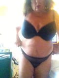 Slave taking black bra off, saying what she is snapshot 1