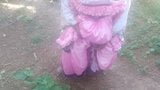 A man in a pink dress snapshot 4