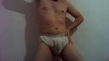 Showing off and teasing in Tommy Hilfiger white briefs snapshot 3