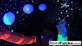 Romi and Dani lesbian black-light fun snapshot 11