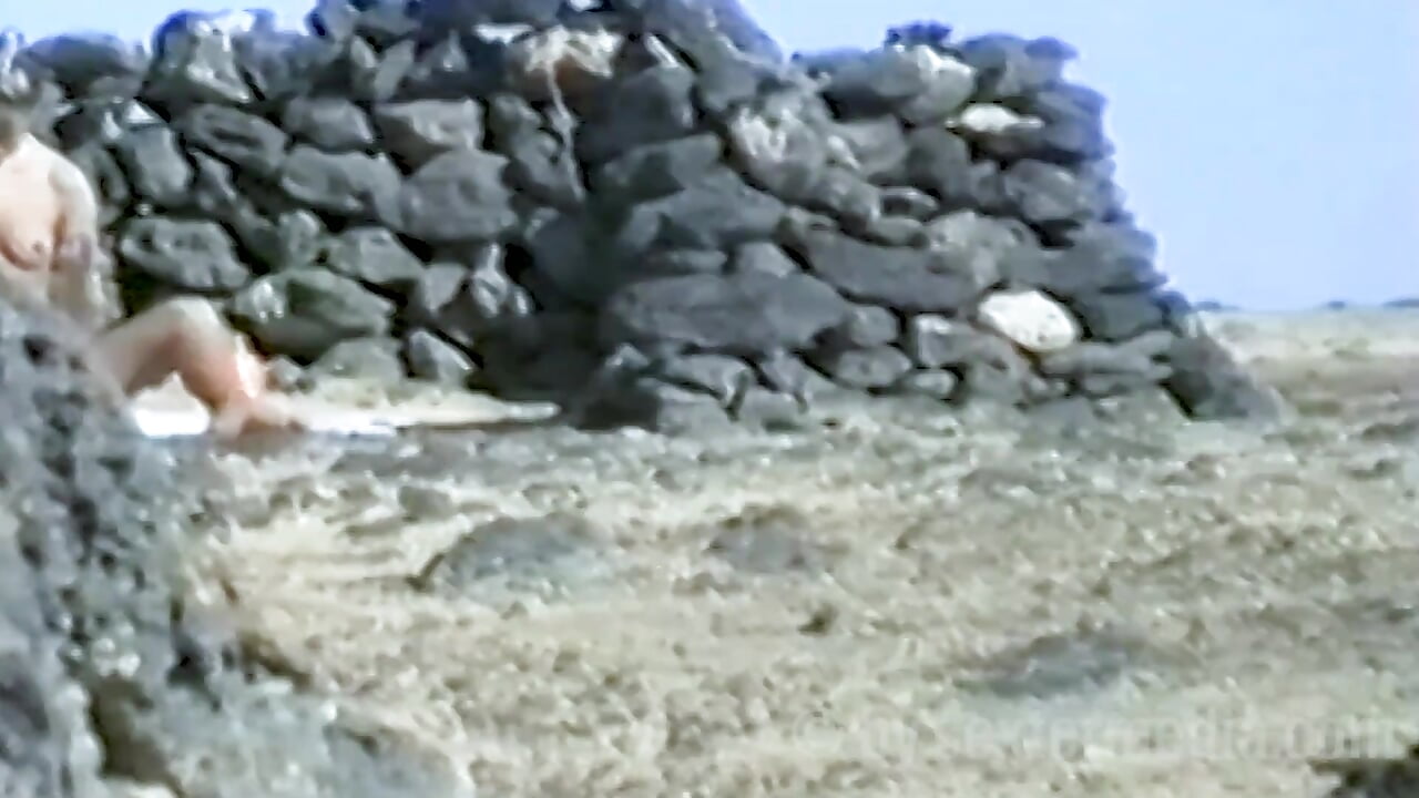 Sexy Blonde Naked on a Rocky Beach