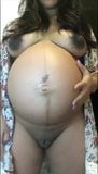 Pregnant woman showing her body snapshot 4