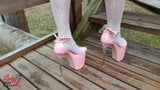 Lady L walking in towering pink extreme high heels. snapshot 4