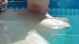 Swimming around naked in a garden pool with teasing snapshot 5