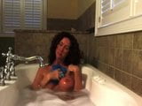 Hot milf masturbates in the tub snapshot 14