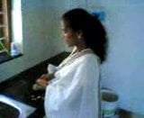 Indian wife in kitchen snapshot 1