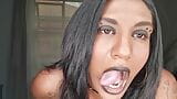 Desi slut dirty talking while playing, displaying her tongue and soft lips snapshot 13