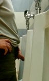 viejo showing his cock en  el urinal snapshot 3