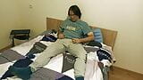 Guy is jerking on the bed and cums on his T-shirt snapshot 3