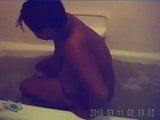 miss tiffiney washing her backside...... snapshot 1