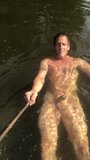 Nudist skinny dipping in river snapshot 8