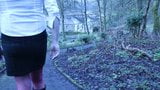 Transvestite outdoors in a park snapshot 1